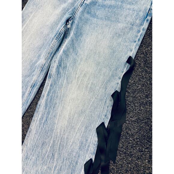 Alice + Olivia Blue Flare Jeans with Black Bow Accents - Picture 9 of 12